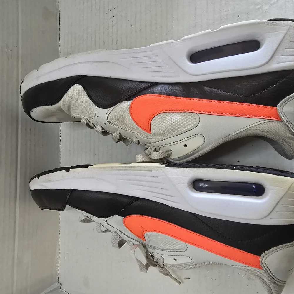 White and Black Athletic Shoes with Orange‎ Highlights